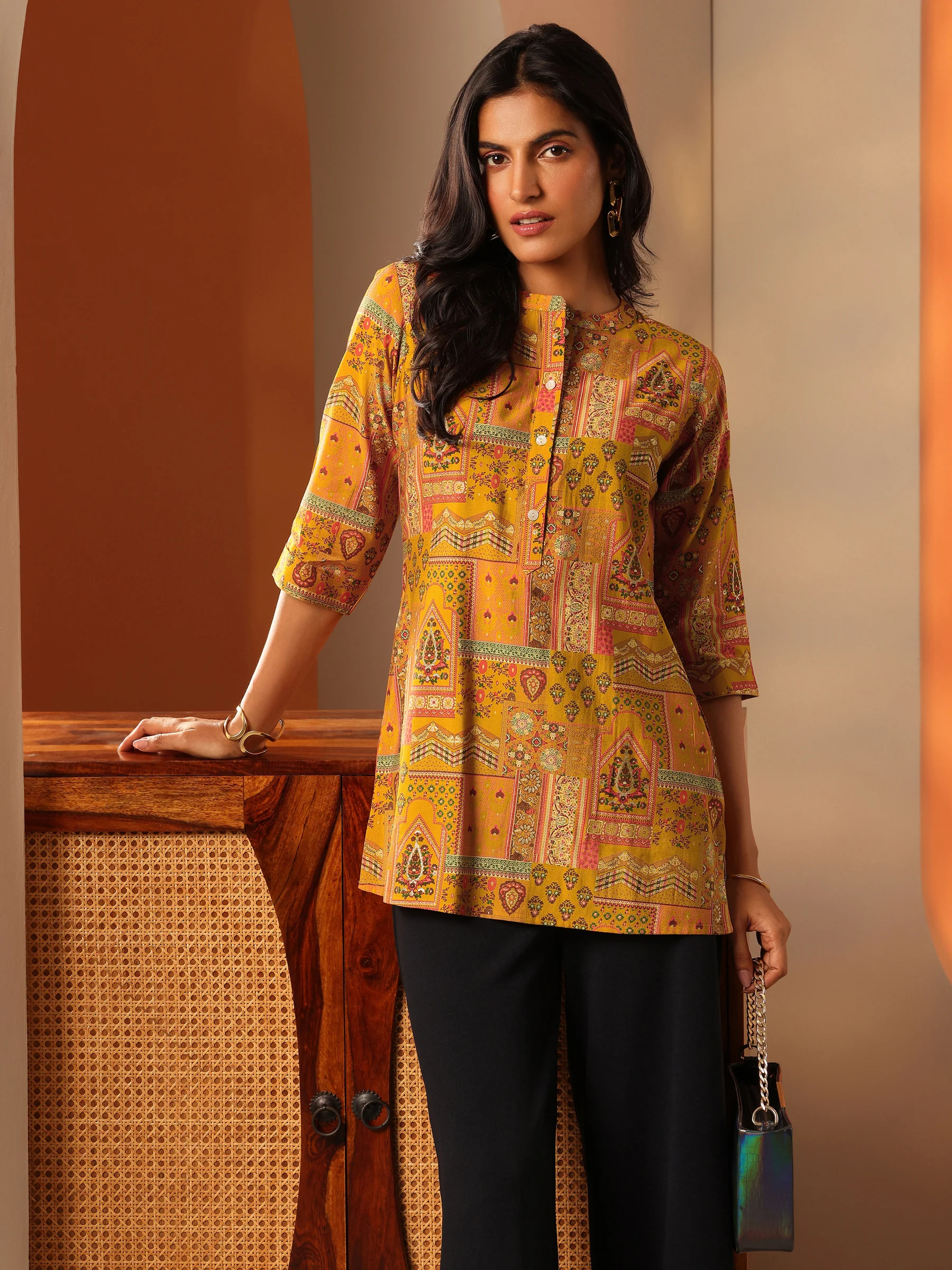 29743_5MAIN.webp Mustard Printed Silk Blend Straight Short Kurti - Image 1